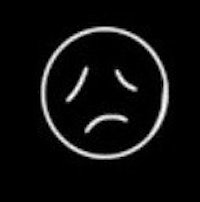 an image of a sad face on a black background