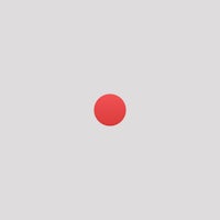 a red dot on a gray background