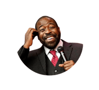a man in a suit and tie is holding a microphone